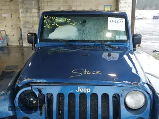 ✅ 2009 Jeep Wrangler Unlimited Sahara • VIN: 1J4GA59189L738915 • Lot: 43422352. Listed on IAAI with 173,994 mi. Free auction sales archive from the USA and detailed vehicle history report at DreamBid. Image 19.