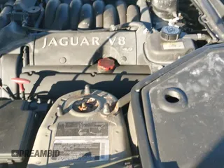 ✅ 2001 Jaguar XK • VIN: SAJDA42C81NA14881 • Lot: 41317312. Listed on IAAI with 141,755 mi. Free auction sales archive from the USA and detailed vehicle history report at DreamBid. Image 12.