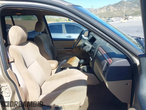 ✅ 1999 Jeep Grand Cherokee Laredo • VIN: 1J4GW58S1XC705487 • Lot: 44938711. Wystawiony na IAAI z przebiegiem 239 232 mil. Bezpłatny archiwum sprzedaży aukcyjnych z USA i szczegółowy raport historii pojazdu na DreamBid. Zdjęcie 5.