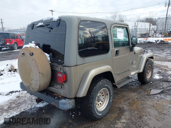 ✅ 2003 Jeep Wrangler Sahara • VIN: 1J4FA59S73P326036 • Lot: 43945249. Wystawiony na IAAI z przebiegiem 82 052 mil. Bezpłatny archiwum sprzedaży aukcyjnych z USA i szczegółowy raport historii pojazdu na DreamBid. Zdjęcie 4.