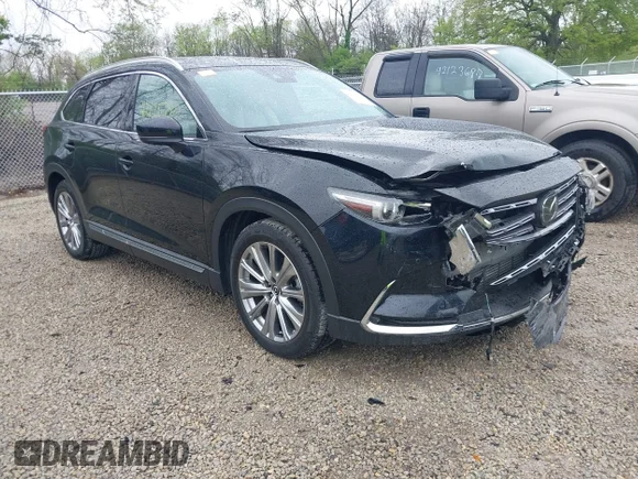 ✅ 2022 Mazda CX-9 Signature • VIN: JM3TCBEY1N0616982 • Лот: 42125790. Опубліковано раніше на IAAI з пробігом 101 918 миль. Безкоштовний доступ до архіву аукціонних продажів зі США та докладний звіт про історію автомобіля на DreamBid. Зображення 1.