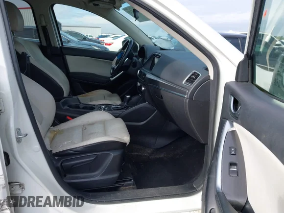 ✅ 2016 Mazda CX-5 Grand Touring • VIN: JM3KE2DY5G0681845 • Лот: 44211743. Опубликован ранее на IAAI с пробегом 141 800 миль. Бесплатный доступ к архиву аукционных продаж из США и подробный отчёт об истории автомобиля на DreamBid. Изображение 5.