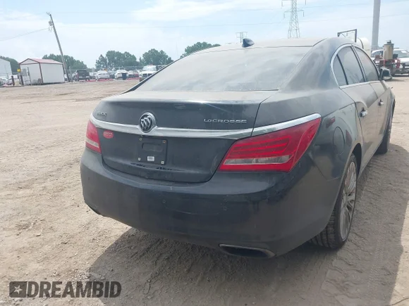 ✅ 2015 Buick LaCrosse Premium II • VIN: 1G4GF5G3XFF261504 • Лот: 42950948. Опубліковано раніше на IAAI з пробігом 263 225 миль. Безкоштовний доступ до архіву аукціонних продажів зі США та докладний звіт про історію автомобіля на DreamBid. Зображення 4.