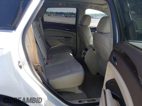 ✅ 2016 Cadillac SRX Premium Collection • VIN: 3GYFNDE37GS586215 • Lot: 44984225. Wystawiony na IAAI z przebiegiem 131 761 mil. Bezpłatny archiwum sprzedaży aukcyjnych z USA i szczegółowy raport historii pojazdu na DreamBid. Zdjęcie 8.