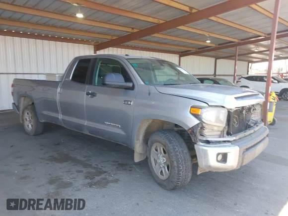 ✅ 2018 Toyota Tundra SR • VIN: 5TFTY5F10JX010152 • Лот: 42675778. Опубликован ранее на IAAI с пробегом 152 860 миль. Бесплатный доступ к архиву аукционных продаж из США и подробный отчёт об истории автомобиля на DreamBid. Изображение 1.