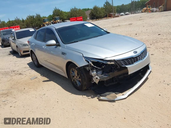 ✅ 2019 Kia Optima S • VIN: 5XXGT4L3XKG350238 • Лот: 45130848. Опубліковано раніше на IAAI з пробігом 89 121 миль. Безкоштовний доступ до архіву аукціонних продажів зі США та докладний звіт про історію автомобіля на DreamBid. Зображення 1.