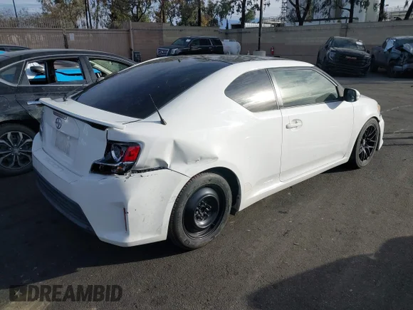 ✅ 2014 Scion tC • VIN: JTKJF5C73E3086539 • Lot: 44227975. Wystawiony na IAAI z przebiegiem 144 272 mil. Bezpłatny archiwum sprzedaży aukcyjnych z USA i szczegółowy raport historii pojazdu na DreamBid. Zdjęcie 4.
