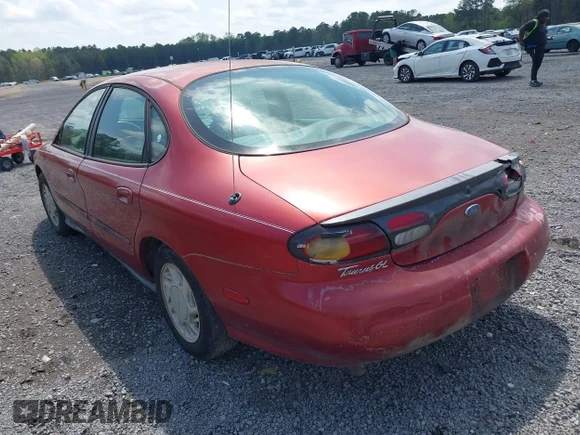✅ 1997 Ford Taurus GL • VIN: 1FALP52U7VA263051 • Lot: 41940263. Wystawiony na IAAI z przebiegiem 229 778 mil. Bezpłatny archiwum sprzedaży aukcyjnych z USA i szczegółowy raport historii pojazdu na DreamBid. Zdjęcie 3.