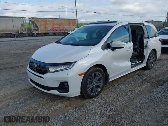 ✅ 2025 Honda Odyssey Touring • VIN: 5FNRL6H87SB021699 • Лот: 45000951. Опубликован ранее на IAAI с пробегом 11 550 миль. Бесплатный доступ к архиву аукционных продаж из США и подробный отчёт об истории автомобиля на DreamBid. Изображение 2.