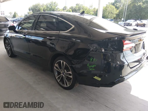 ✅ 2020 Ford Fusion Titanium • VIN: 3FA6P0D91LR192327 • Lot: 45403465. Wystawiony na IAAI z przebiegiem 109 526 mil. Bezpłatny archiwum sprzedaży aukcyjnych z USA i szczegółowy raport historii pojazdu na DreamBid. Zdjęcie 3.