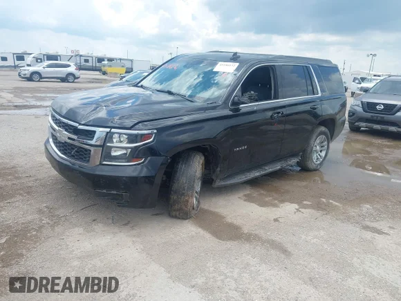 ✅ 2018 Chevrolet Tahoe LT • VIN: 1GNSKBKC0JR338721 • Lot: 45186172. Listed on IAAI with 112,697 mi. Free auction sales archive from the USA and detailed vehicle history report at DreamBid. Image 2.