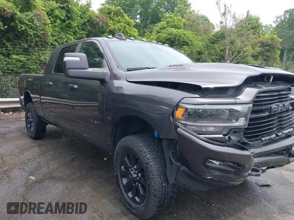 ✅ 2023 Ram 2500 Laramie • VIN: 3C6UR5NJ7PG523857 • Lot: 42289140. Listed on IAAI with 49,130 mi. Free auction sales archive from the USA and detailed vehicle history report at DreamBid. Image 1.