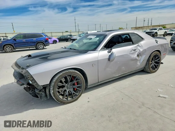 ✅ 2016 Dodge Challenger SRT Hellcat • VIN: 2C3CDZC92GH117167 • Lot: 49122136. Listed on Copart with 98,793 mi. Free auction sales archive from the USA and detailed vehicle history report at DreamBid. Image 1.