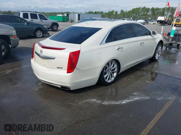 ✅ 2013 Cadillac XTS Premium • VIN: 2G61S5S35D9103948 • Lot: 43390786. Wystawiony na IAAI z przebiegiem 159 206 mil. Bezpłatny archiwum sprzedaży aukcyjnych z USA i szczegółowy raport historii pojazdu na DreamBid. Zdjęcie 4.