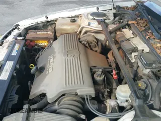 ✅ 1999 Pontiac Bonneville SE • VIN: 1G2HX52K7XH254153 • Лот: 43210009. Опубликован ранее на IAAI с пробегом 253 173 миль. Бесплатный доступ к архиву аукционных продаж из США и подробный отчёт об истории автомобиля на DreamBid. Изображение 12.