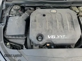 2017 Chevrolet Impala LT z VIN 2G1105S33H9118224, wystawiony jako Copart lot #89814575 z przebiegiem 99 760 mil mil oraz Szkoda całkowita • Salvage title. Historia ofert i sprzedaży dostępna na DreamBid. Obrazek 14.