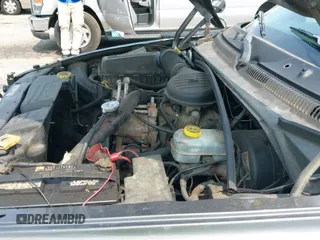 2002 Dodge Dakota Sport z VIN 1B7GL32X92S644072, wystawiony jako IAAI lot #42400800 z przebiegiem 232 611 mil mil oraz . Historia ofert i sprzedaży dostępna na DreamBid. Obrazek 19.