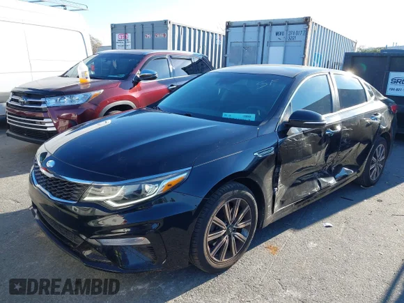 ✅ 2019 Kia Optima LX • VIN: 5XXGT4L38KG361612 • Лот: 43718963. Опубликован ранее на IAAI с пробегом 76 235 миль. Бесплатный доступ к архиву аукционных продаж из США и подробный отчёт об истории автомобиля на DreamBid. Изображение 2.
