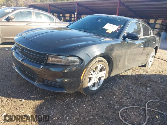✅ 2015 Dodge Charger SE • VIN: 2C3CDXBGXFH752110 • Lot: 44244727. Listed on IAAI with 194,838 mi. Free auction sales archive from the USA and detailed vehicle history report at DreamBid. Image 2.