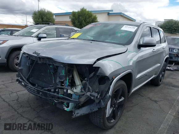 ✅ 2015 Jeep Grand Cherokee Laredo • VIN: 1C4RJEAG4FC160144 • Lot: 43724728. Listed on IAAI with 100,600 mi. Free auction sales archive from the USA and detailed vehicle history report at DreamBid. Image 2.