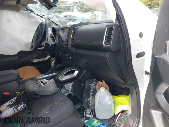 ✅ 2023 Nissan Frontier Pro-4X • VIN: 1N6ED1EK4PN606471 • Lot: 43396281. Wystawiony na IAAI z przebiegiem 32 716 mil. Bezpłatny archiwum sprzedaży aukcyjnych z USA i szczegółowy raport historii pojazdu na DreamBid. Zdjęcie 5.
