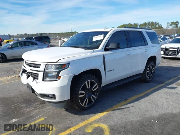 ✅ 2018 Chevrolet Tahoe Premier • VIN: 1GNSKCKJ0JR277276 • Lot: 44112717. Wystawiony na IAAI z przebiegiem 153 904 mil. Bezpłatny archiwum sprzedaży aukcyjnych z USA i szczegółowy raport historii pojazdu na DreamBid. Zdjęcie 2.