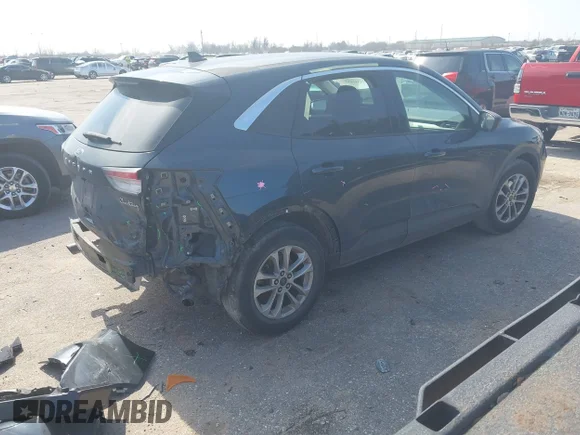 ✅ 2022 Ford Escape SE • VIN: 1FMCU0G67NUB51294 • Lot: 44331432. Listed on IAAI with 47,882 mi. Free auction sales archive from the USA and detailed vehicle history report at DreamBid. Image 4.
