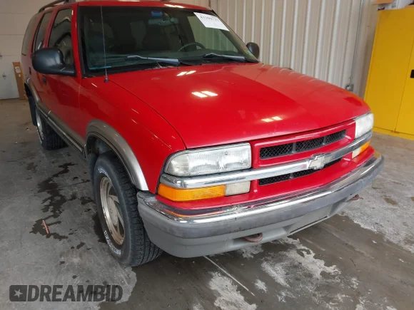 ✅ 1998 Chevrolet Blazer LS • VIN: 1GNDT13WXW2254155 • Lot: 43390737. Listed on IAAI with 202,191 mi. Free auction sales archive from the USA and detailed vehicle history report at DreamBid. Image 1.