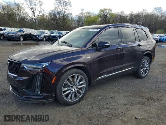 ✅ 2020 Cadillac XT6 AWD Sport • VIN: 1GYKPGRS0LZ164988 • Лот: 50284426. Опубликован ранее на Copart с пробегом 83 723 миль. Бесплатный доступ к архиву аукционных продаж из США и подробный отчёт об истории автомобиля на DreamBid. Изображение 1.