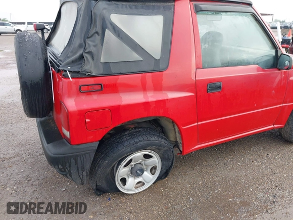 ✅ 1996 Chevrolet Tracker • VIN: 2CNBE1865T6946093 • Lot: 42120266. Wystawiony na IAAI z przebiegiem 180 736 mil. Bezpłatny archiwum sprzedaży aukcyjnych z USA i szczegółowy raport historii pojazdu na DreamBid. Zdjęcie 6.