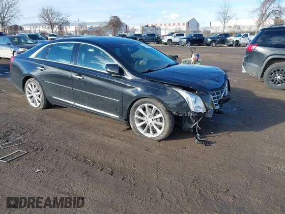 ✅ 2013 Cadillac XTS Premium • VIN: 2G61T5S34D9131589 • Lot: 44183368. Wystawiony na IAAI z przebiegiem 114 049 mil. Bezpłatny archiwum sprzedaży aukcyjnych z USA i szczegółowy raport historii pojazdu na DreamBid. Zdjęcie 1.