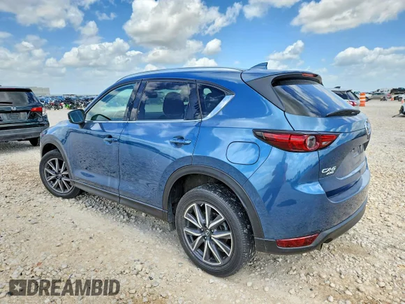 ✅ 2018 Mazda CX-5 Grand Touring • VIN: JM3KFBDM3J0451058 • Lot: 58413896. Wystawiony na Copart z przebiegiem 41 834 mil. Bezpłatny archiwum sprzedaży aukcyjnych z USA i szczegółowy raport historii pojazdu na DreamBid. Zdjęcie 2.