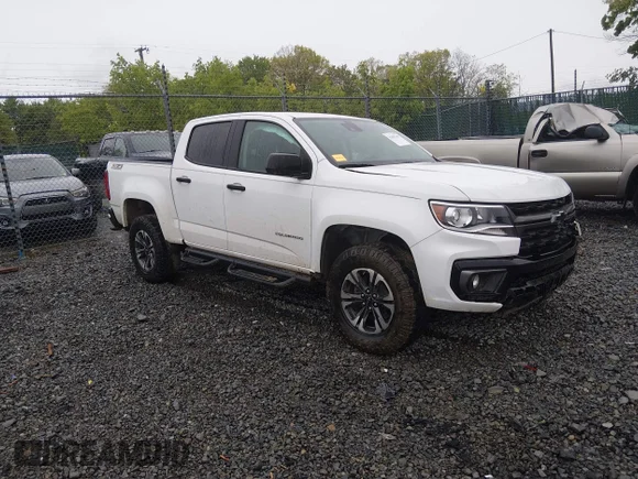 ✅ 2021 Chevrolet Colorado 4WD Z71 • VIN: 1GCGTDEN5M1162353 • Lot: 45065296. Listed on IAAI with 91,476 mi. Free auction sales archive from the USA and detailed vehicle history report at DreamBid. Image 1.
