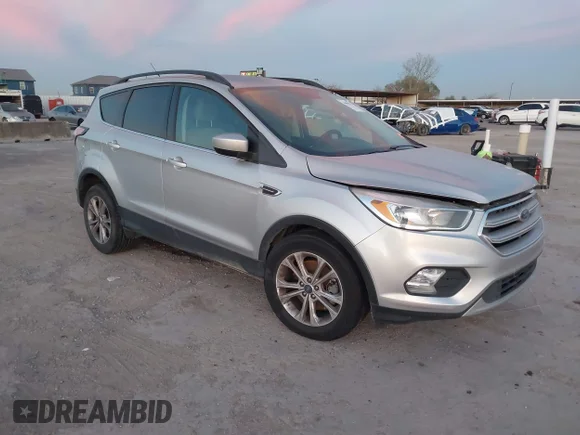 ✅ 2018 Ford Escape SE • VIN: 1FMCU0G93JUB49000 • Lot: 44062771. Wystawiony na IAAI z przebiegiem 112 928 mil. Bezpłatny archiwum sprzedaży aukcyjnych z USA i szczegółowy raport historii pojazdu na DreamBid. Zdjęcie 1.