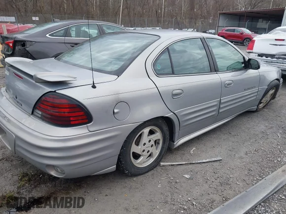 ✅ 2000 Pontiac Grand Am SE1 • VIN: 1G2NF52E0YC541526 • Lot: 43844805. Wystawiony na IAAI z przebiegiem 146 987 mil. Bezpłatny archiwum sprzedaży aukcyjnych z USA i szczegółowy raport historii pojazdu na DreamBid. Zdjęcie 4.