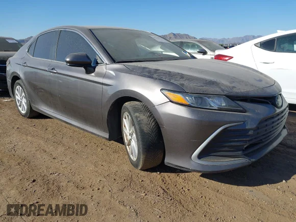 ✅ 2022 Toyota Camry LE • VIN: 4T1C11AKXNU037245 • Лот: 45318778. Опубликован ранее на IAAI с пробегом 120 302 миль. Бесплатный доступ к архиву аукционных продаж из США и подробный отчёт об истории автомобиля на DreamBid. Изображение 1.