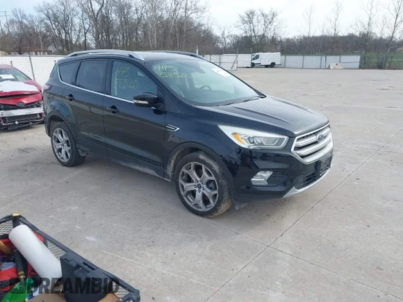 ✅ 2017 Ford Escape Titanium • VIN: 1FMCU9J90HUC87603 • Лот: 44558520. Опубликован ранее на IAAI с пробегом 151 901 миль. Бесплатный доступ к архиву аукционных продаж из США и подробный отчёт об истории автомобиля на DreamBid. Изображение 1.