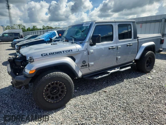 ✅ 2021 Jeep Gladiator 80th Anniversary • VIN: 1C6HJTAG9ML506385 • Лот: 54965836. Опубліковано раніше на Copart з пробігом 59 575 миль. Безкоштовний доступ до архіву аукціонних продажів зі США та докладний звіт про історію автомобіля на DreamBid. Зображення 1.