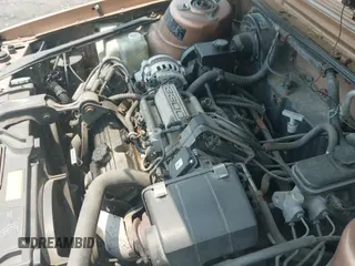 ✅ 1989 Oldsmobile Cutlass Ciera • VIN: 2G3AM11N1K2367760 • Lot: 42456355. Wystawiony na IAAI z przebiegiem 128 050 mil. Bezpłatny archiwum sprzedaży aukcyjnych z USA i szczegółowy raport historii pojazdu na DreamBid. Zdjęcie 18.