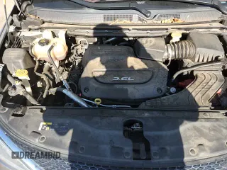 ✅ 2019 Chrysler Pacifica Touring Plus • VIN: 2C4RC1FG8KR549463 • Лот: 89526765. Опубликован ранее на Copart с пробегом 103 616 миль. Бесплатный доступ к архиву аукционных продаж из США и подробный отчёт об истории автомобиля на DreamBid. Изображение 16.