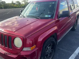 ✅ 2009 Jeep Patriot Sport • VIN: 1J4FT28B89D207707 • Lot: 82126825. Listed on Copart with 220,103 mi. Free auction sales archive from the USA and detailed vehicle history report at DreamBid. Image 11.