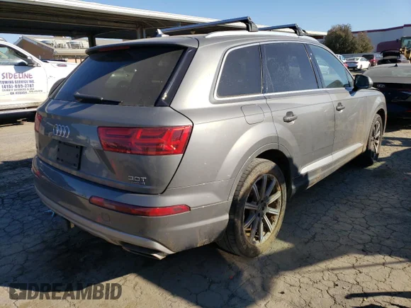 ✅ 2018 Audi Q7 Premium • VIN: WA1AAAF76JD013013 • Лот: 38242263. Опубліковано раніше на Copart з пробігом 54 725 миль. Безкоштовний доступ до архіву аукціонних продажів зі США та докладний звіт про історію автомобіля на DreamBid. Зображення 3.