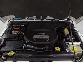 ✅ 2014 Jeep Wrangler Unlimited Sahara • VIN: 1C4BJWEG9EL206986 • Лот: 65411765. Опубликован ранее на Copart с пробегом 125 747 миль. Бесплатный доступ к архиву аукционных продаж из США и подробный отчёт об истории автомобиля на DreamBid. Изображение 16.