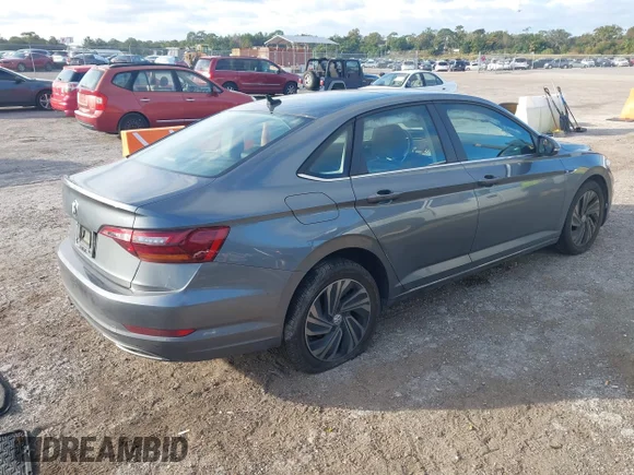 ✅ 2019 Volkswagen Jetta SEL Premium • VIN: 3VWG57BU8KM083134 • Lot: 43649274. Wystawiony na IAAI z przebiegiem 100 182 mil. Bezpłatny archiwum sprzedaży aukcyjnych z USA i szczegółowy raport historii pojazdu na DreamBid. Zdjęcie 4.