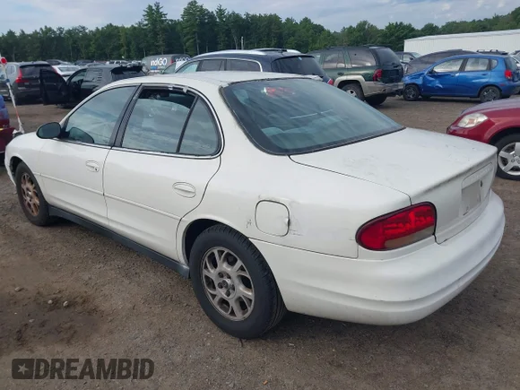 ✅ 2001 Oldsmobile Intrigue GX • VIN: 1G3WH52H61F110519 • Lot: 43106295. Wystawiony na IAAI z przebiegiem 106 501 mil. Bezpłatny archiwum sprzedaży aukcyjnych z USA i szczegółowy raport historii pojazdu na DreamBid. Zdjęcie 3.