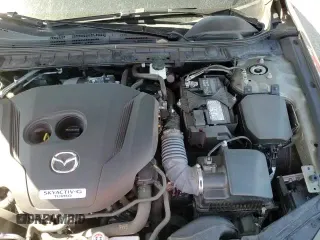 ✅ 2024 Mazda 3 Carbon Edition • VIN: 3MZBPBXY8RM404442 • Лот: 48104015. Опубликован ранее на Copart с пробегом 16 382 миль. Бесплатный доступ к архиву аукционных продаж из США и подробный отчёт об истории автомобиля на DreamBid. Изображение 15.