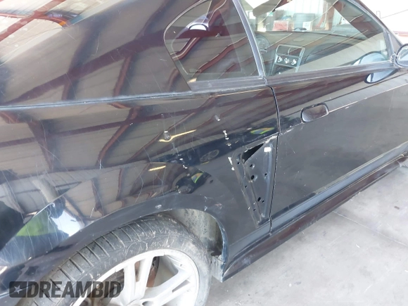 ✅ 2003 Ford Mustang Premium Mach 1 • VIN: 1FAFP42R83F437440 • Lot: 42310934. Wystawiony na IAAI z przebiegiem 110 726 mil. Bezpłatny archiwum sprzedaży aukcyjnych z USA i szczegółowy raport historii pojazdu na DreamBid. Zdjęcie 6.