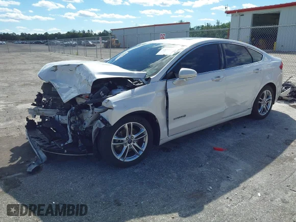 ✅ 2015 Ford Fusion Titanium Hybrid • VIN: 3FA6P0RU8FR123653 • Lot: 43445753. Wystawiony na IAAI z przebiegiem 97 875 mil. Bezpłatny archiwum sprzedaży aukcyjnych z USA i szczegółowy raport historii pojazdu na DreamBid. Zdjęcie 2.
