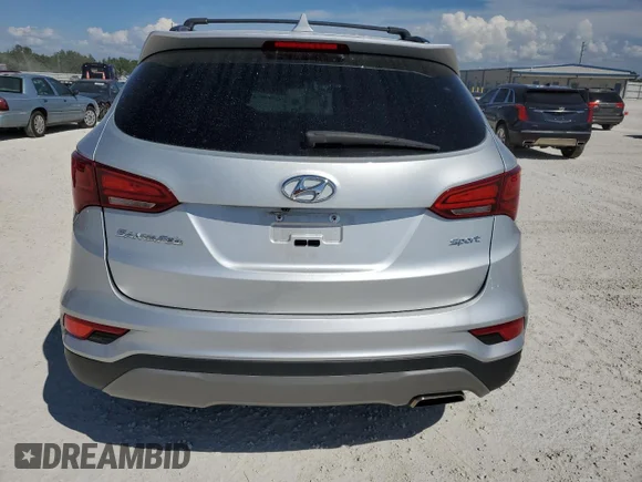 ✅ 2018 Hyundai Santa Fe 2.4L • VIN: 5XYZU3LB2JG529553 • Lot: 45578823. Wystawiony na Copart z przebiegiem 31 567 mil. Bezpłatny archiwum sprzedaży aukcyjnych z USA i szczegółowy raport historii pojazdu na DreamBid. Zdjęcie 6.