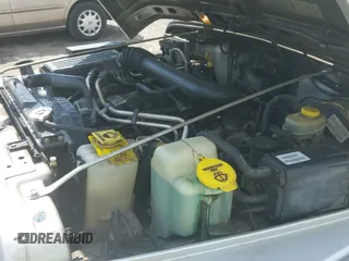 ✅ 2002 Jeep Wrangler X • VIN: 1J4FA39S02P748202 • Lot: 43266082. Wystawiony na IAAI z przebiegiem 199 437 mil. Bezpłatny archiwum sprzedaży aukcyjnych z USA i szczegółowy raport historii pojazdu na DreamBid. Zdjęcie 22.